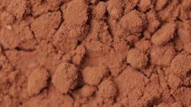 Dönen kakao tozu makro çekim.
