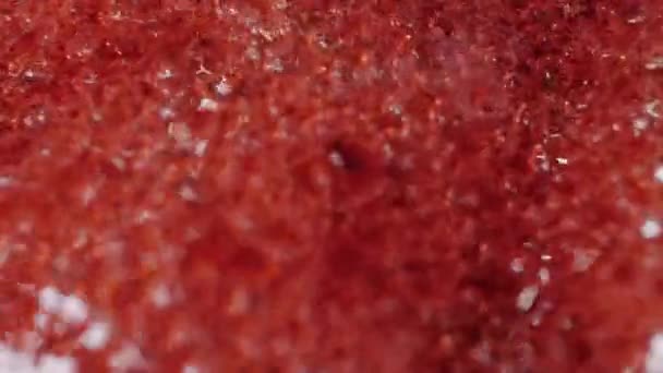 Sfondo di marmellata di mirtilli rossi, macro shot . — Video Stock