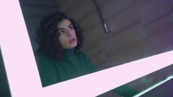 Depressed pretty woman looking at mirror reflection, touching hair, insecurities — Stock Video