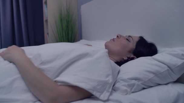 Distressed lady having sleep problems in bed, nightmares from stressful life — Stock Video