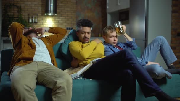 Three young men suffering hangover headache after alcohol abuse at party — Stock Video