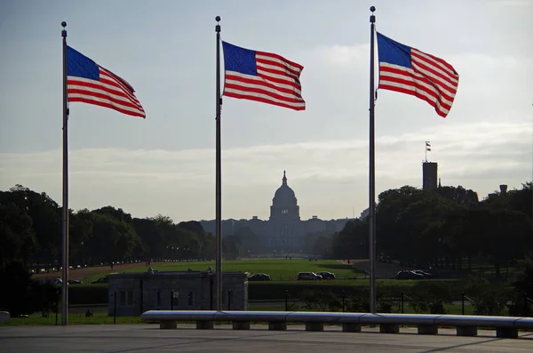 Capitol Building viewed from Washington Monument flag circle. — Stock Photo, Image