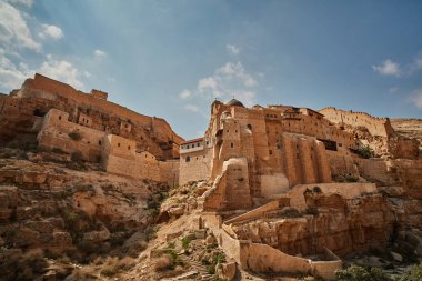 Mar Saba monastery at the desert (Israel) clipart