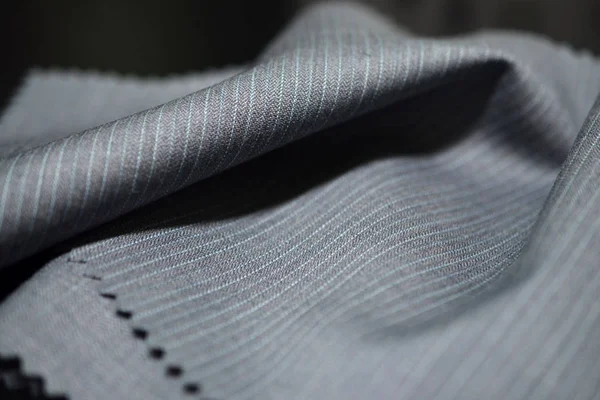Primer plano textura gris tela con azul línea de traje — Foto de Stock