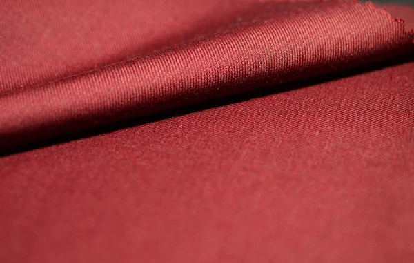 Крупним планом рулон червона тканина костюма Ліцензійні Стокові Зображення