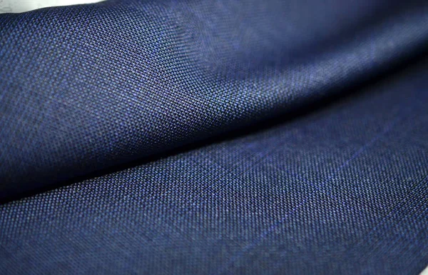 Close up rolo textura azul tecido de terno — Fotografia de Stock