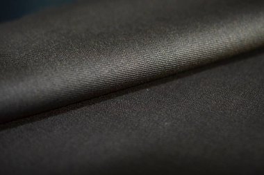 yakın kadar rulo doku kahverengi kumaştan takım elbise