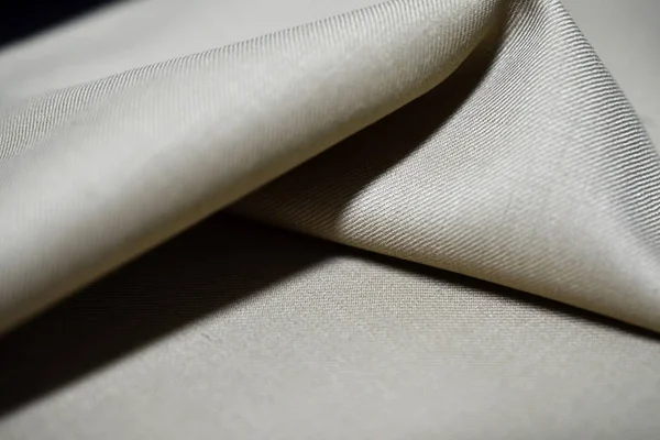 クローズ アップ スーツのテクスチャのクリーム色の布 — ストック写真