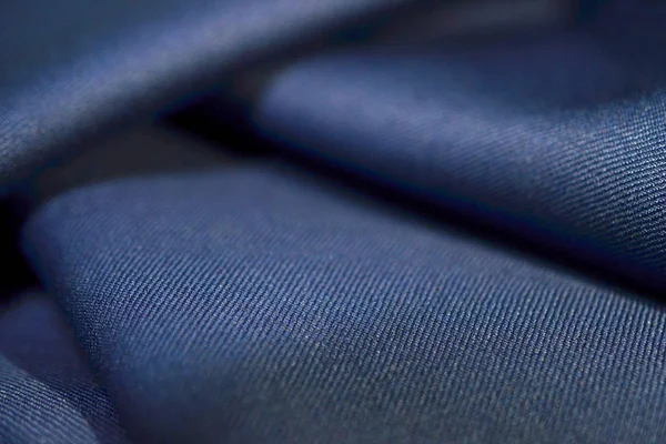 Крупним планом текстура темно-синя тканина костюма Стокове Фото