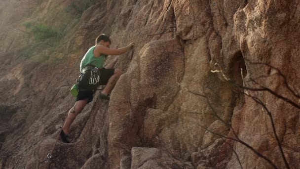 Young Man Climbing Rock — Stock Video