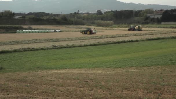 Tractors Working in a Field — Αρχείο Βίντεο