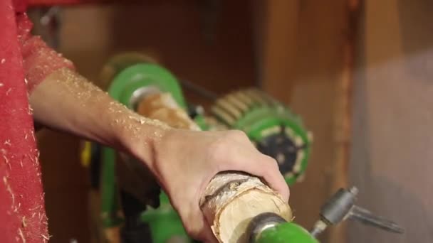 Foot operated spring pole wood lathe.Man operating a foot operated spring pole wood lathe. — Stock Video