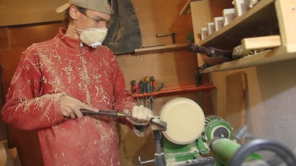 Foot operated spring pole wood lathe.Man operating a foot operated spring pole wood lathe. — Stock Video