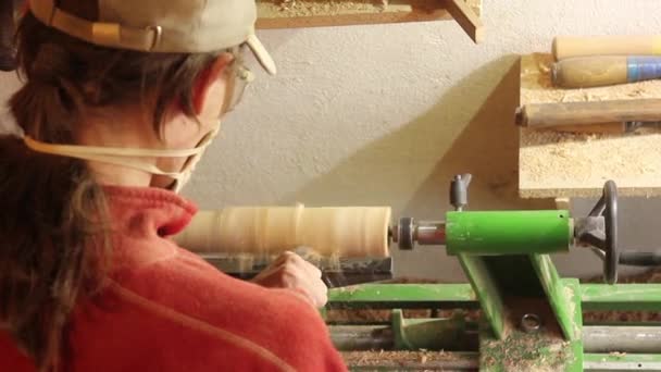 Foot operated spring pole wood lathe.Man operating a foot operated spring pole wood lathe. — Stock Video