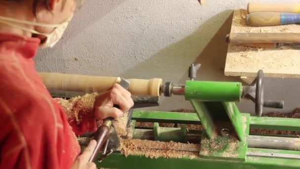 Foot operated spring pole wood lathe.Man operating a foot operated spring pole wood lathe. — Stock Video