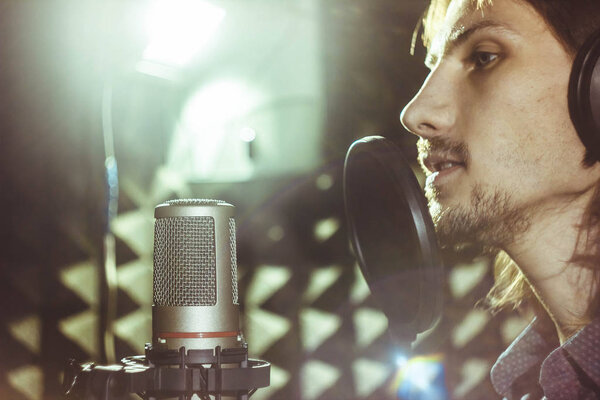 man singing in the Studio