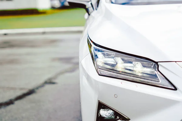 Stock image Car headlight in front