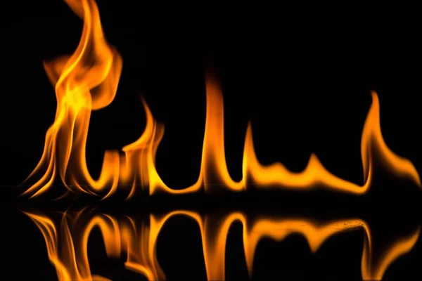 Flames isolated on black — Stock Photo, Image