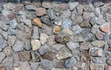 Arka plan için eski kaya duvarının dokusu