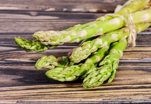 Asparagus on wooden background — Stock Photo, Image