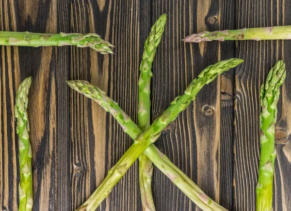 Asparagus on wooden background — Stock Photo, Image