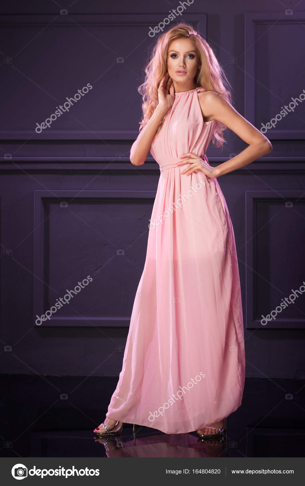 Beautiful blonde in pink dress — Stock Photo © path21 #164804820