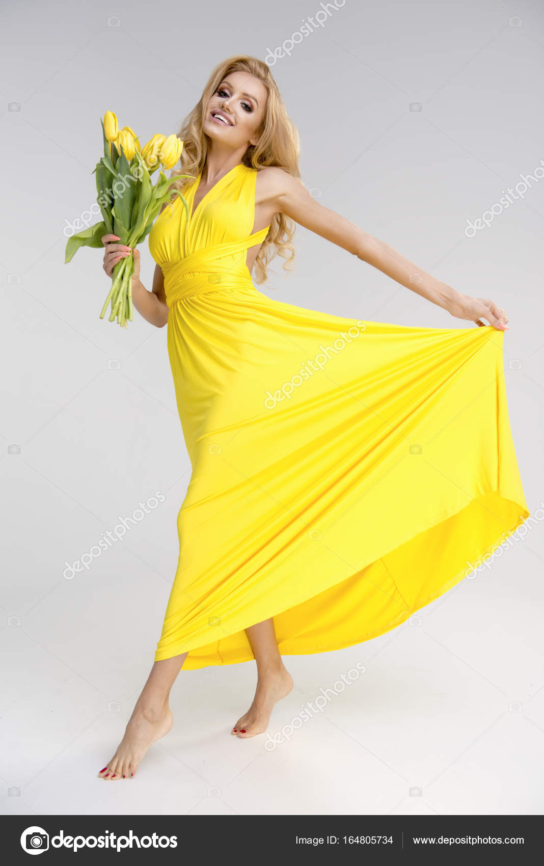 Blonde Girl In Yellow Dress Stock Photo C Path21 164805734