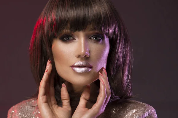 Brunette woman with silver lips — Stock Photo, Image