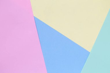 Çok renkli kağıtlar minimalist yaratıcı kavramı arka plan yaptı.