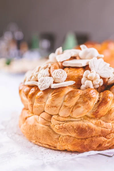 Close up of traditional holiday eastern Orthodox church bread with decoration on table. — Stock Photo, Image