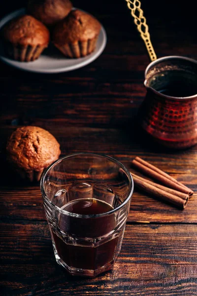 Turkish coffee with spices and muffins