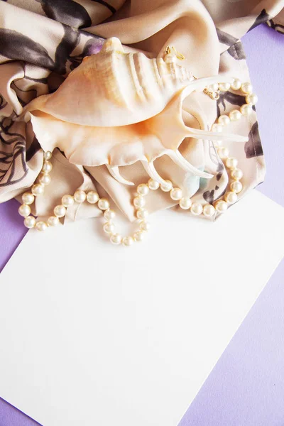 romantic background for photo with various shells and draperies