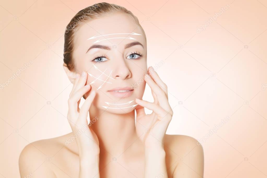  face with surgery marks on pink  background
