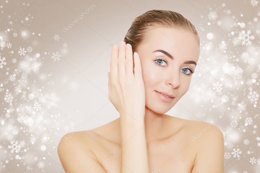 portrait of gorgeous woman over christmas beige  background 