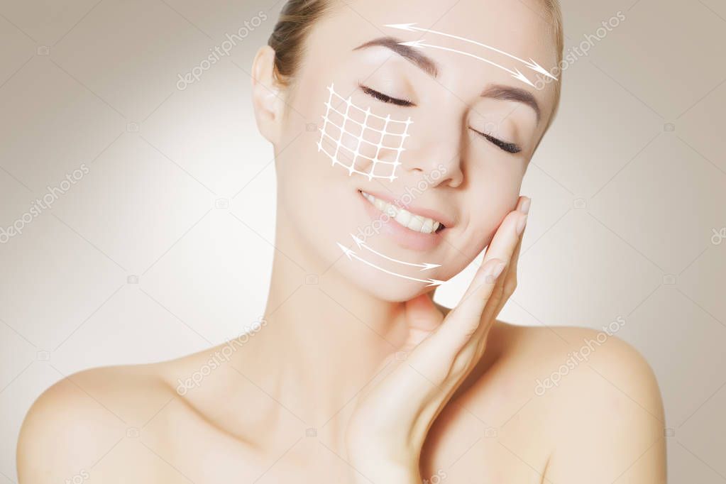  face with surgery marks on beige background