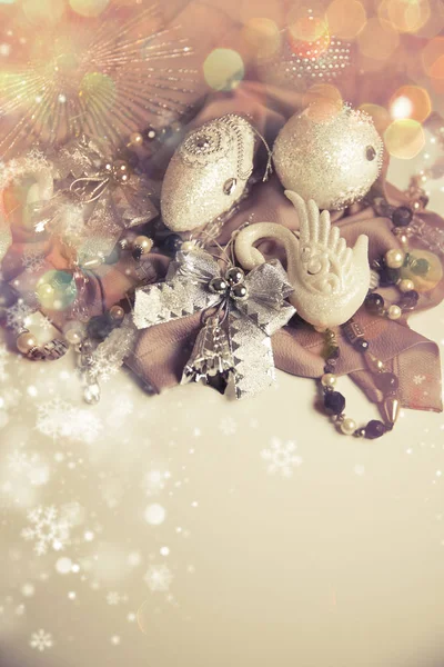 vintage christmas background with toys and snowflakes