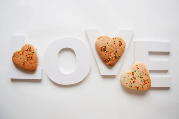 heart cookies with letters love and cookies