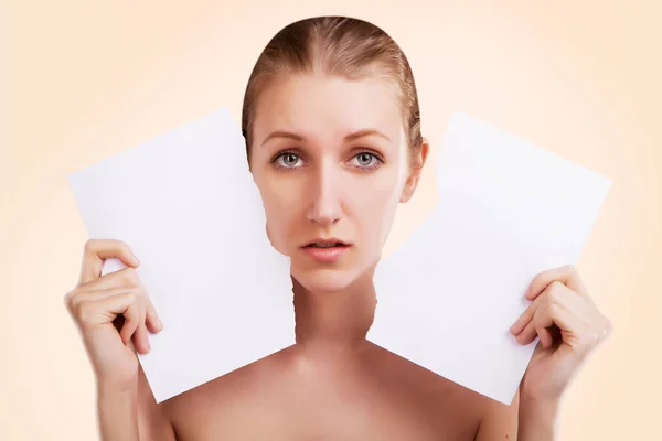 portrait of young blond woman with blank paper for advertisement