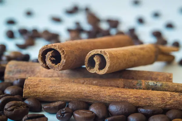 Coffee beans cinnamon stick background — Stock Photo, Image