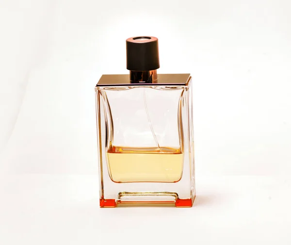 Een fles voor parfum op een witte achtergrond — Stockfoto