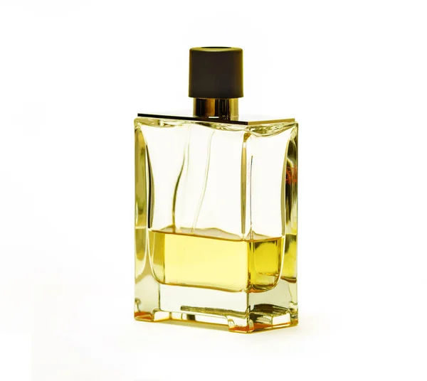 Uma garrafa de perfume sobre um fundo branco — Fotografia de Stock