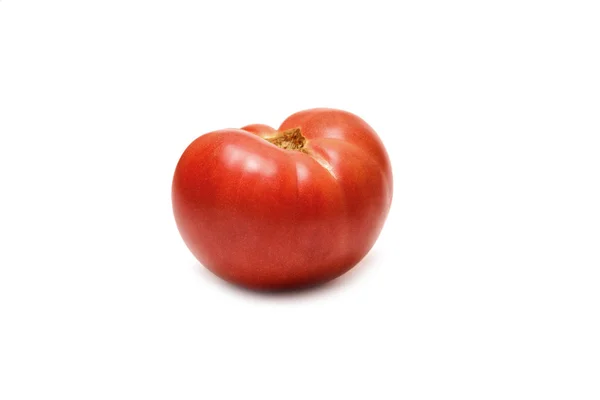 Rote Tomate auf weißem Hintergrund — Stockfoto