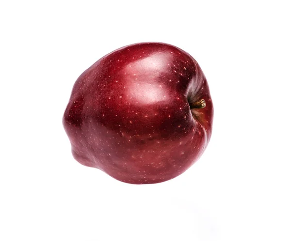 Manzana roja sobre un fondo blanco —  Fotos de Stock