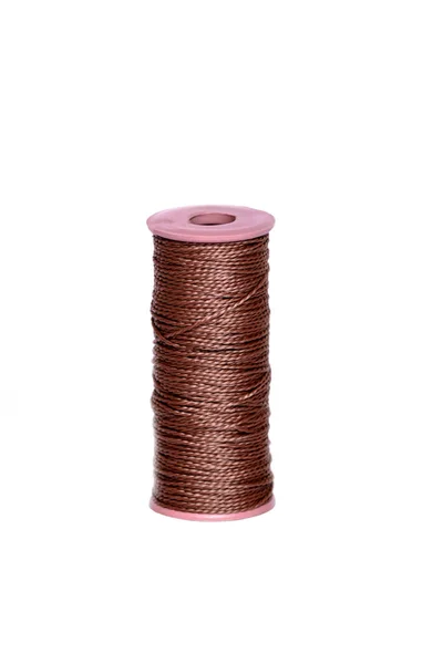 Old coil thread on a white background — Stock Photo, Image