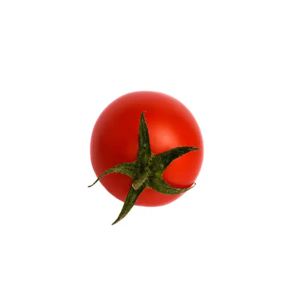 흰색 바탕에 수 분이 많은 빨간 토마토 클로즈업. 세로. — 스톡 사진