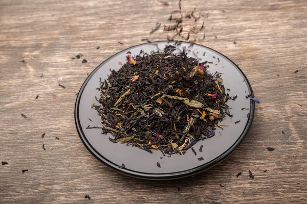 Delicious and aromatic fruity tea with flower petals. Enjoy a tea break at work, at home, visiting friends, family or alone every day. Classic warm or hot drink.