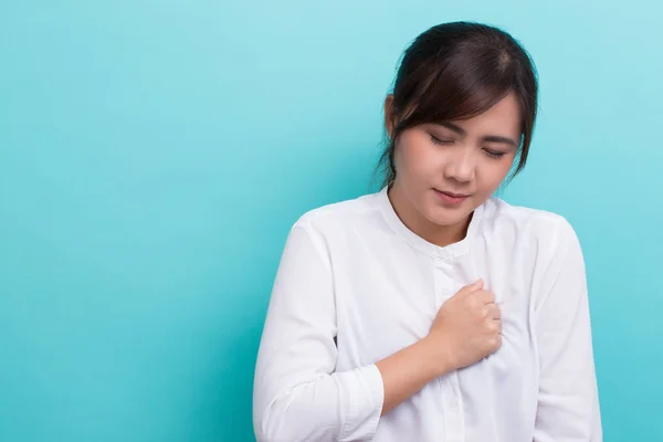 Woman has chest pain — Stock Photo, Image