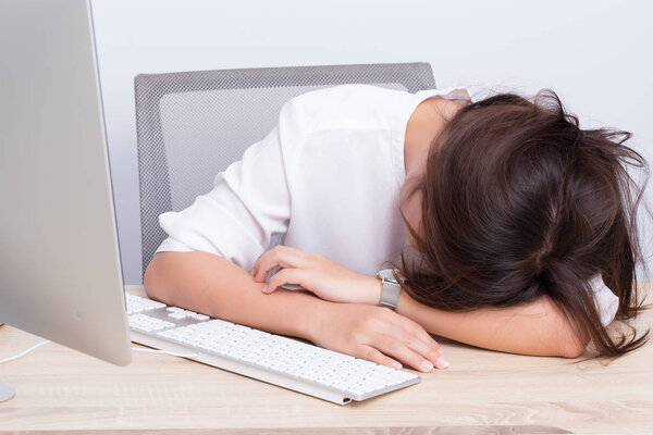 Woman take a nap at office
