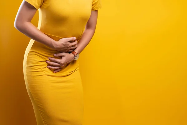 Woman suffers from stomach ache Close up — Stock Photo, Image