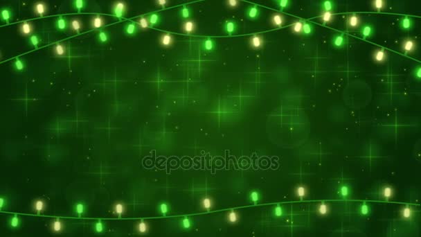 Green background with festive garland lights and glowing particles — Stock Video